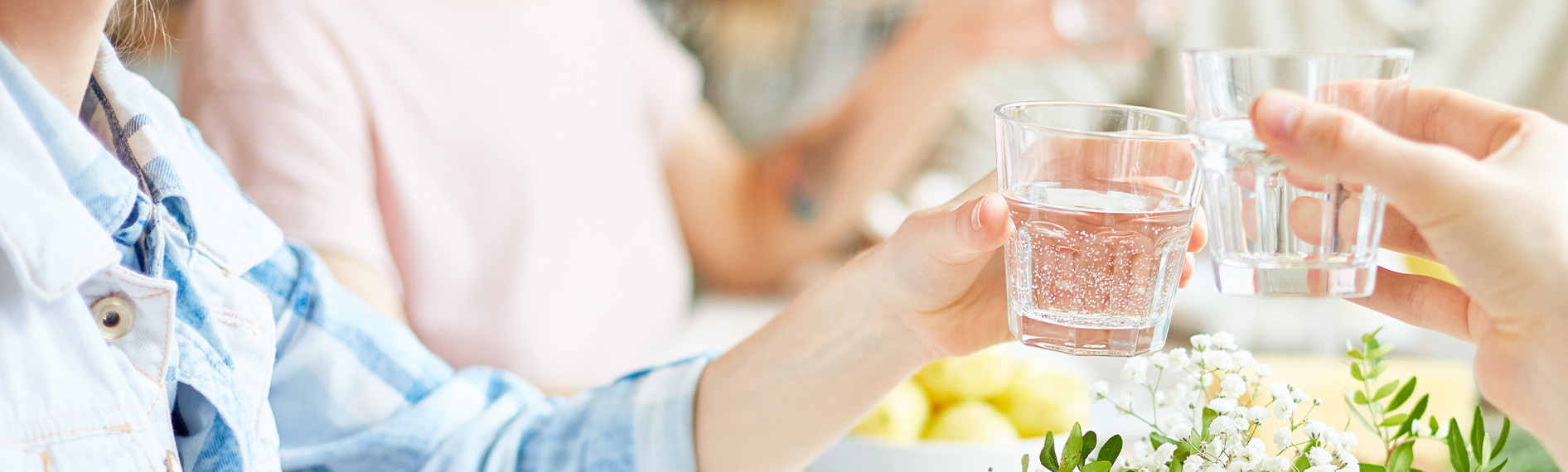 people drinking glasses of water